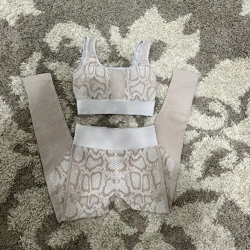 Trendy matching cobra print leggings and sports bra set